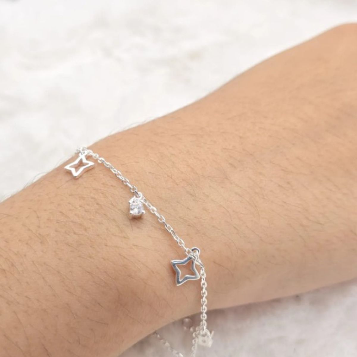 Pulseira-de-prata-925-com-pingente-ponto-de-luz-e-estrela-4-pontas