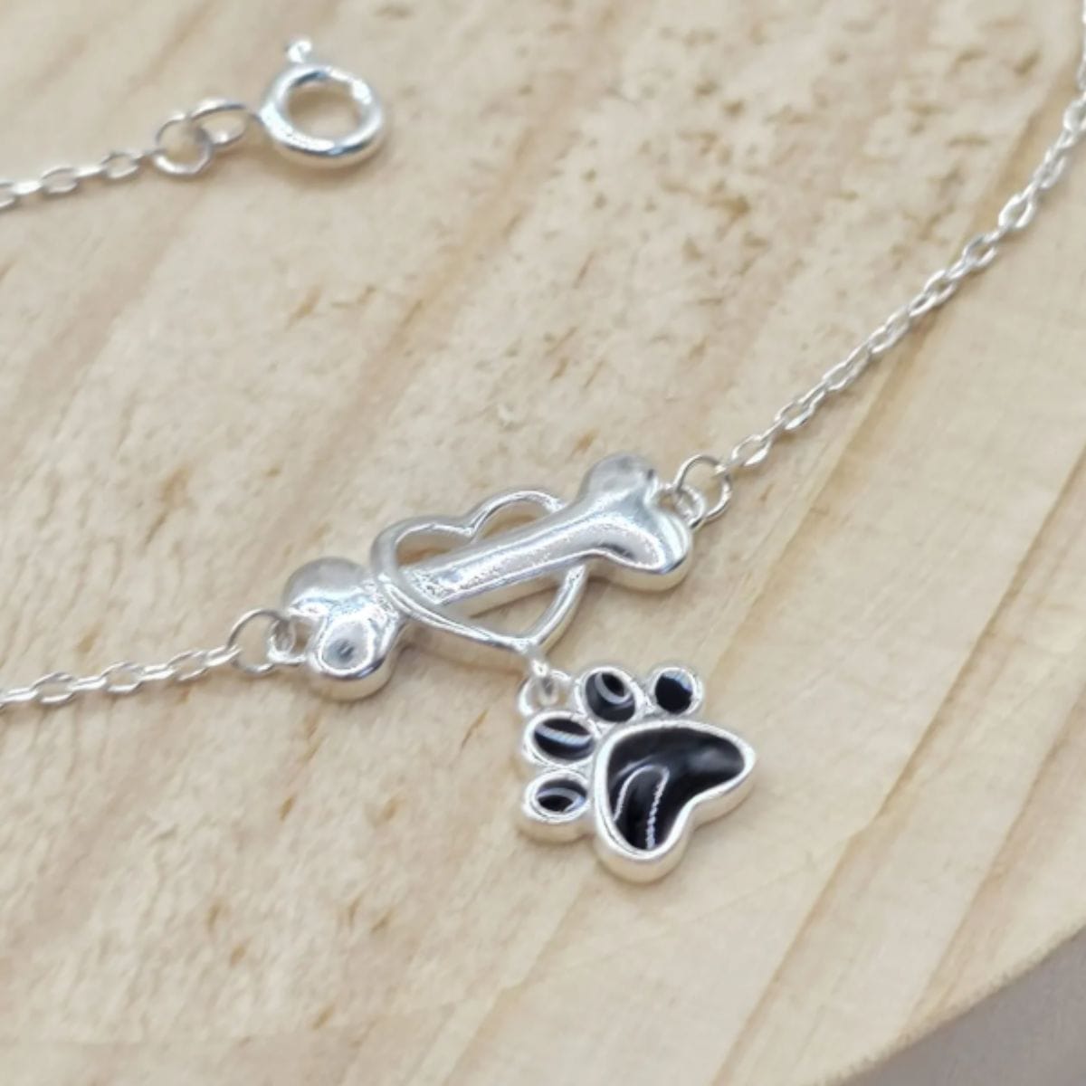 Pulseira de prata 925 com pingente coração com ossinho e patinha - Imagem 3
