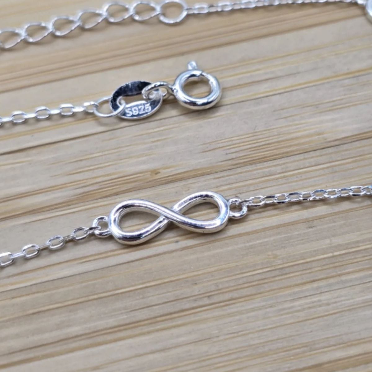 Pulseira-de-prata-925-com-pingente-coração-e-infinito-vazado-com-extensor-ex1