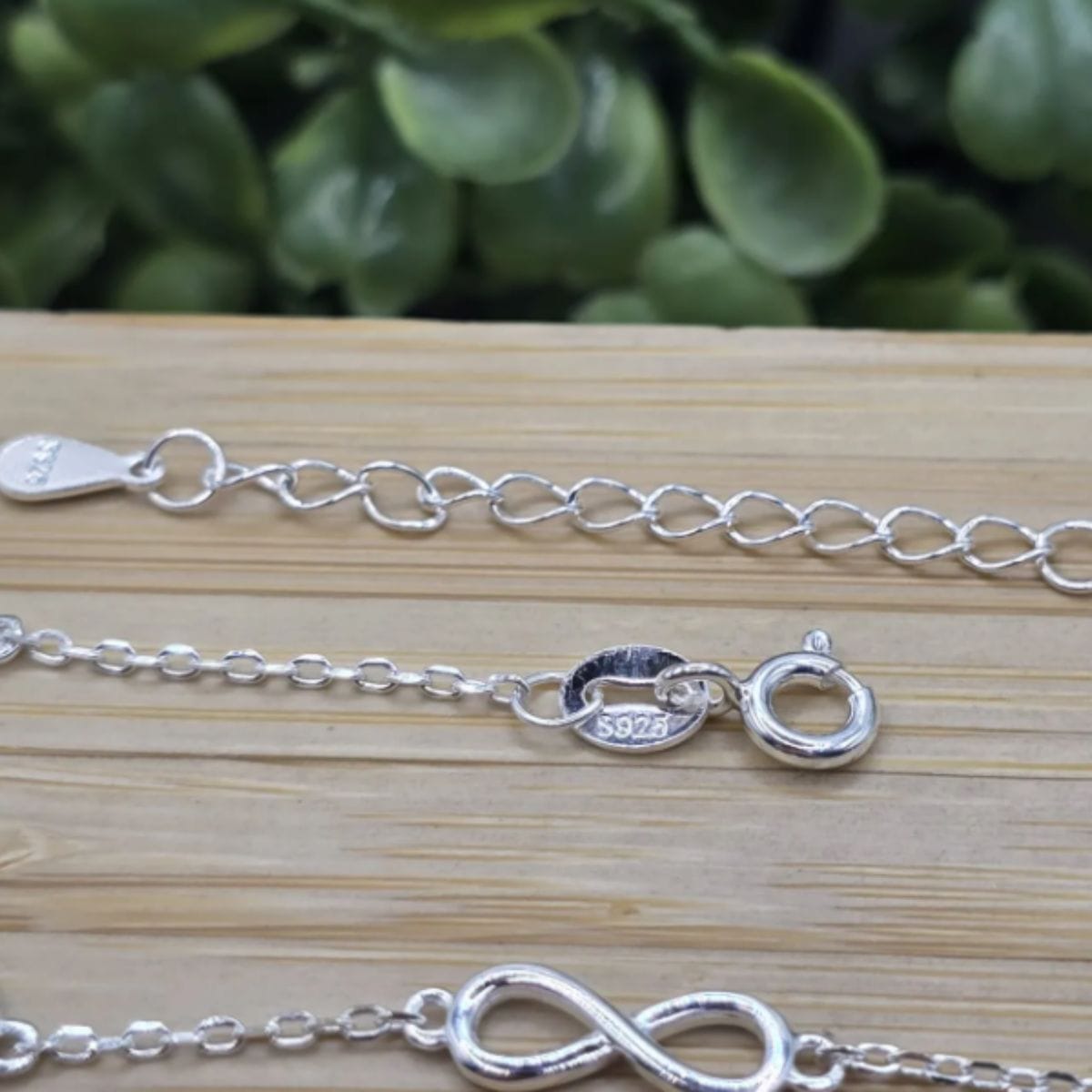 Pulseira de prata 925 com pingente coração e infinito vazado com extensor - Imagem 4