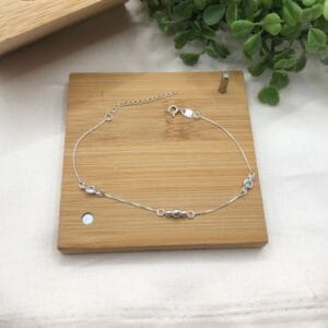 Pulseira-de-prata-925-elo-v12-com-pingente-central-3-bolinhas-e-2-ponto-de-luz