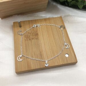 Tornozeleira-de-prata-925-4-luas-vazadas-com-ponto-de-luz